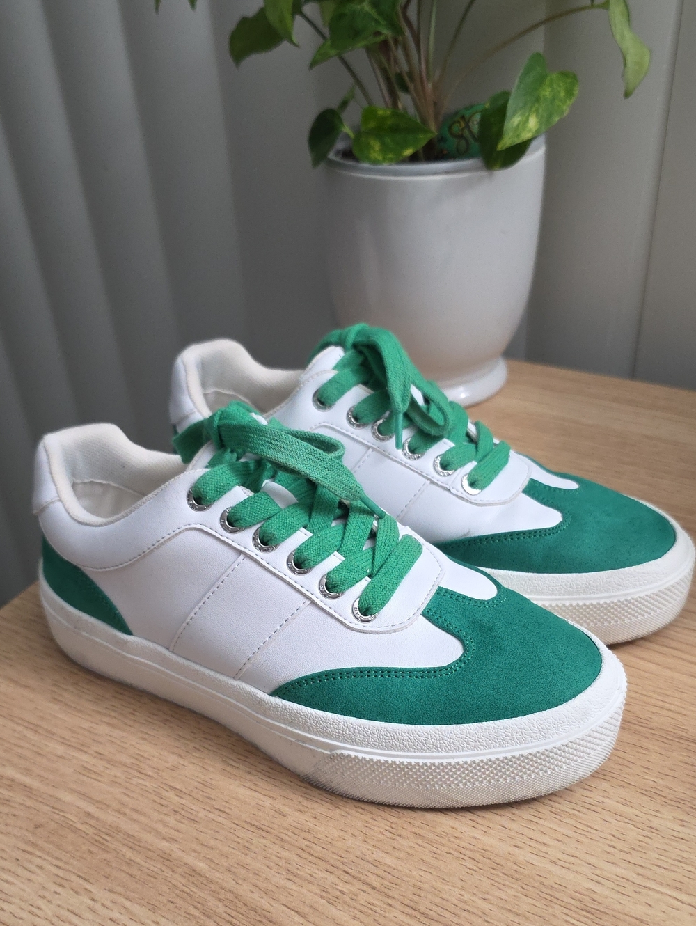 J/SLIDES white and green featuring vibrant green laces and sueden.